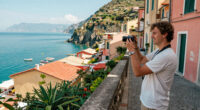 This Cliffside Italian Village Was Named The Happiest Place To Travel In Europe—and It Has Colorful Houses And Pebble Beaches